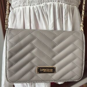 Bebe   Crossbody bag  quilted front and back  vegan leather  gray/ gold tone EUC